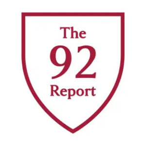The 92 Report Podcast logo - a crimson outline of a shield with the words inside it on a white background.
